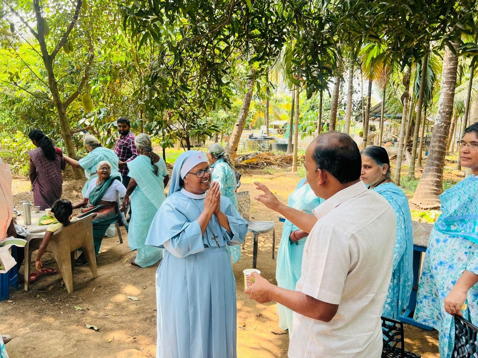 Marrian Foundation team meeting with community members outdoors